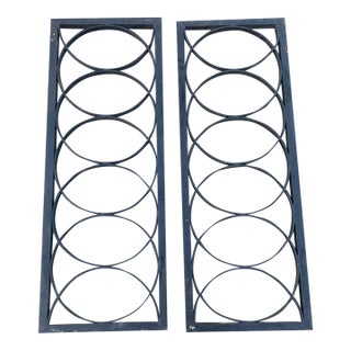 Pair of Heavy Cast Iron Decorative Panels With Interlocking Circular Design For Sale
