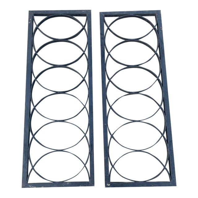 Pair of Heavy Cast Iron Decorative Panels With Interlocking Circular Design For Sale