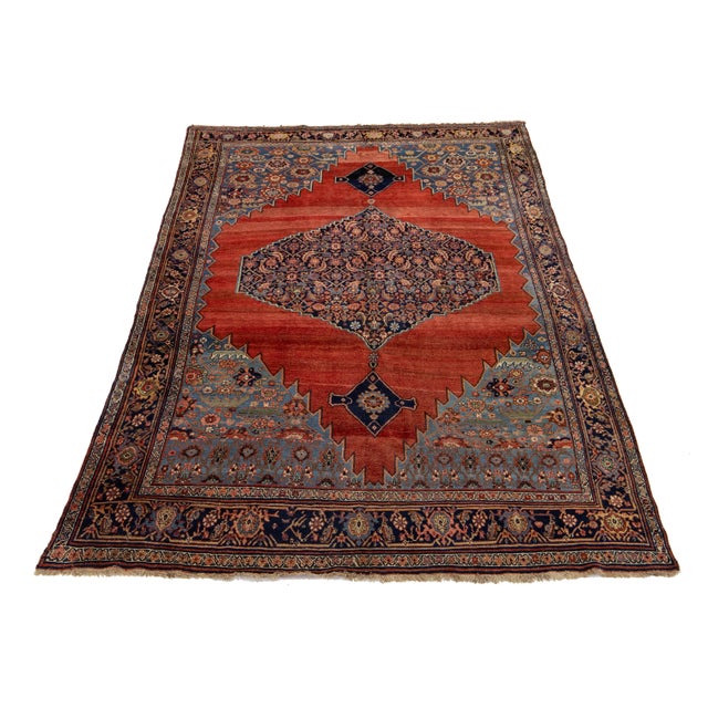 This antique Persian Bidjar wool rug is a captivating statement piece that exudes charm and character. It is meticulously...