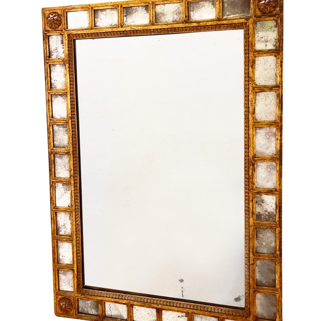 This beautiful giltwood wall mirror was made in France in the 19th century. Retains the original sparkly mercury glass....