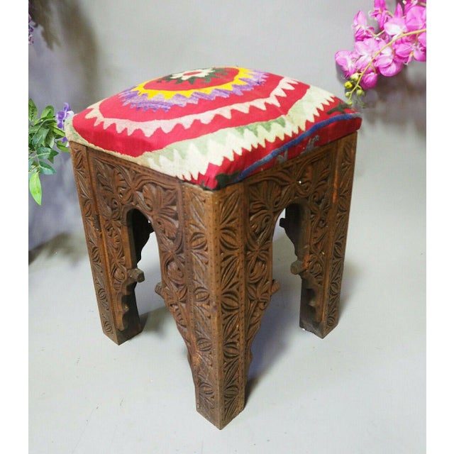 This stool is made of original handmade Suzani and solid wood. It is a Suzani stool upholstered with of an Old Suzani. It...