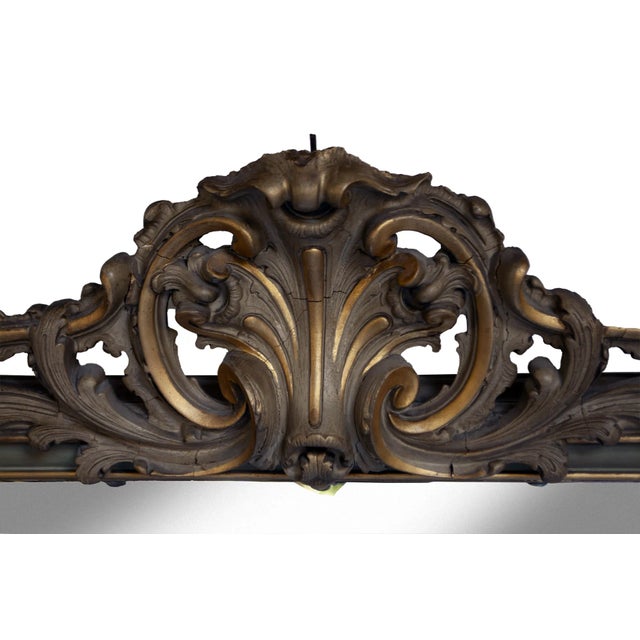 Monumental 19th century, Louis-Philippe Antique French Carved Wood OverMantle Mirror in pale Grey and Gold accents. The...