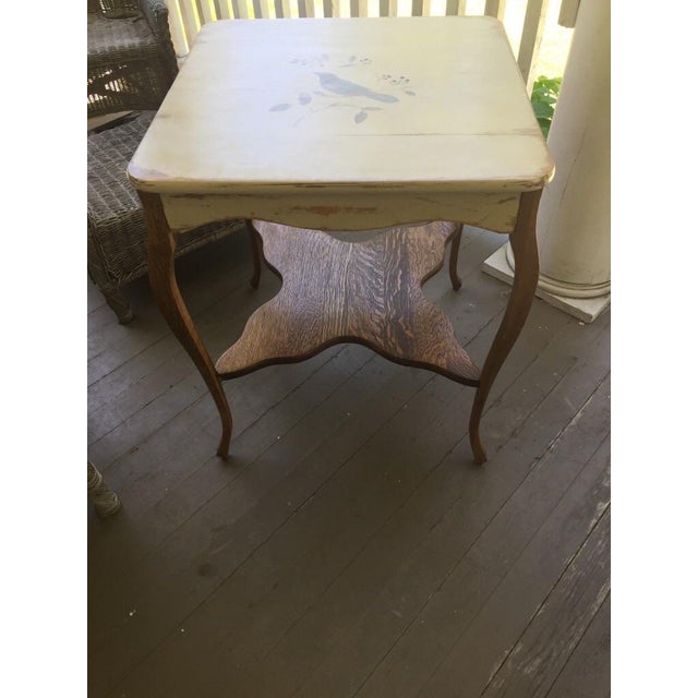 Charming 24” square occasional table with lower shelf. Professionally refinished and tabletop, lovingly hand-painted,...