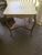 Charming 24” square occasional table with lower shelf. Professionally refinished and tabletop, lovingly hand-painted,...