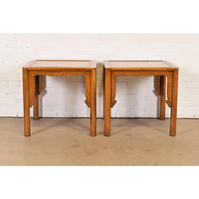 A gorgeous pair of Mid-Century Modern Hollywood Regency Chinoiserie carved elm wood occasional side tables or nightstands...