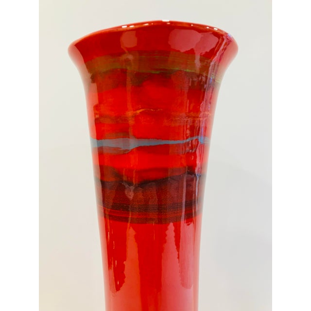 This hand painted vase was made in Italy in the 70’s It is signed Sara hand painted in Italy 20 inches tall 9 inch diameter