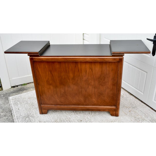 Vintage (1960's) Server Cabinet has an Asian Influence. Made by Thomasville Furniture. The Wood is CherryWood. The Cabinet...