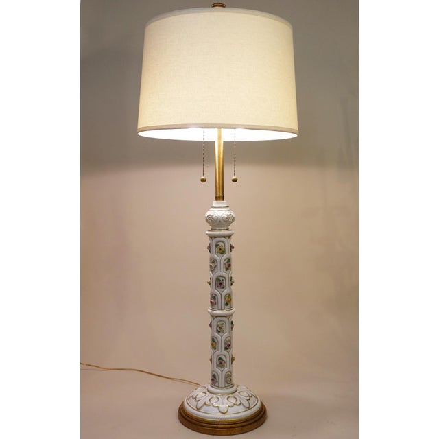 An impressive and visually stunning large Hollywood Regency Modern highly sculptural detailed column form Porcelain &...