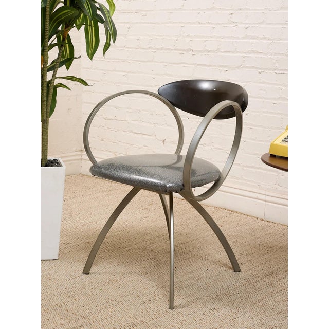 With its modern profile, and stylish frame, this lounge chair is sure to be an eye-catching piece for any style of...