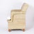 Handsome British colonial armchair crafted with a sturdy metal frame ambitiously wrapped in reed with comfort and classic...