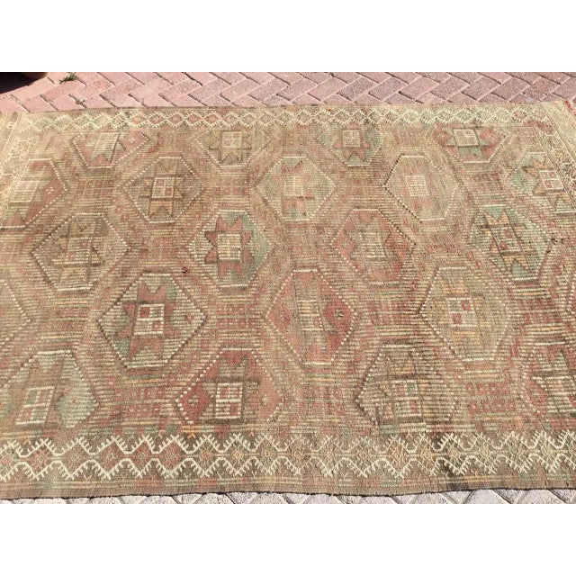 This beautiful, vintage, handwoven kilim is approximately 60 years old. It is handmade, of very fine quality hand spun...