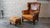 Vintage distressed cognac leather wingback chair and ottoman set, circa 1970s. Beautifully distressed cognac leather with...