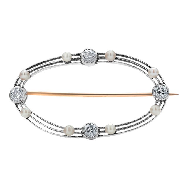 1920 Art Deco Platinum European Diamond 0.60 Carat Natural Pearl 1.4 Inch Wide Brooch For Sale