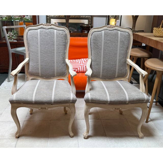 Design Plus Gallery presents a Pair of French Provincial Louis XV Style Armchairs from Jacara’s. Each painted wood frame...