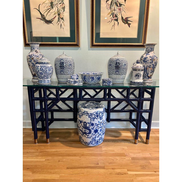 We love unique pieces with a story! This rattan console table was custom made in the 1970’s for a New Orleans businessman...