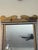 Charming Swedish folk art Trumeau mirror with a hand-painted coastal landscape crest depicting sailboats and cottages. Its...