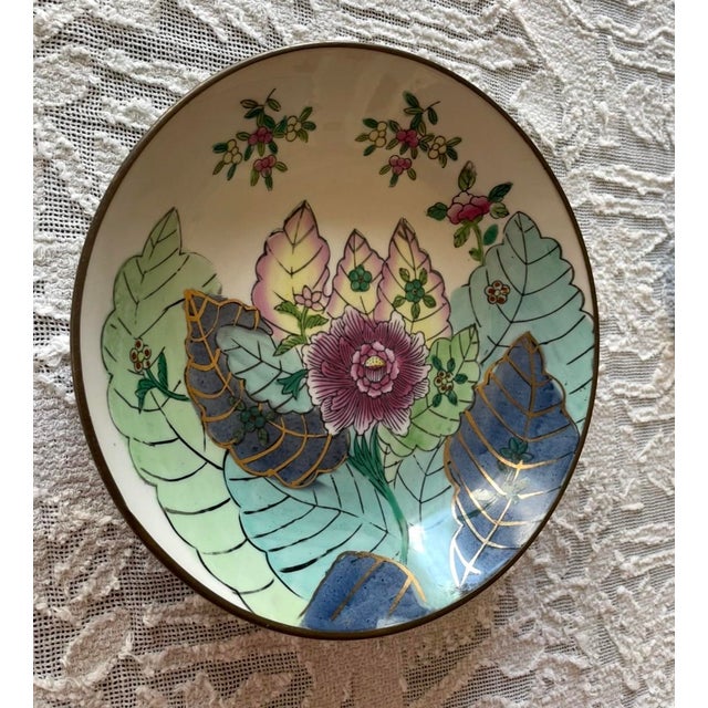 So gorgeous! Porcelain hand-painted plate encased in brass- ready to hang on wall or use as a catch all for keys and...