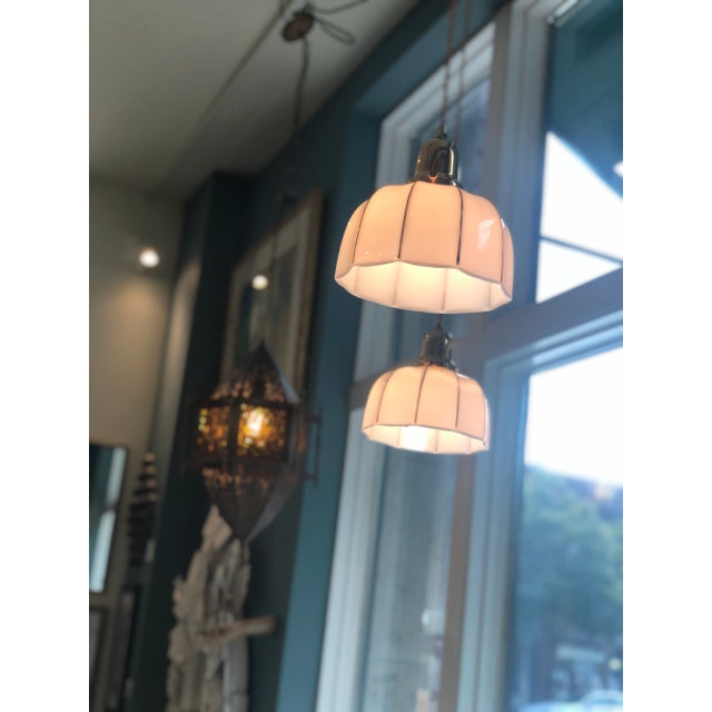 Vintage Milk Glass Pendant w/ Fluted Shade + Gold Detail with a gold twisted cord, newly rewired. Pair available, sold...