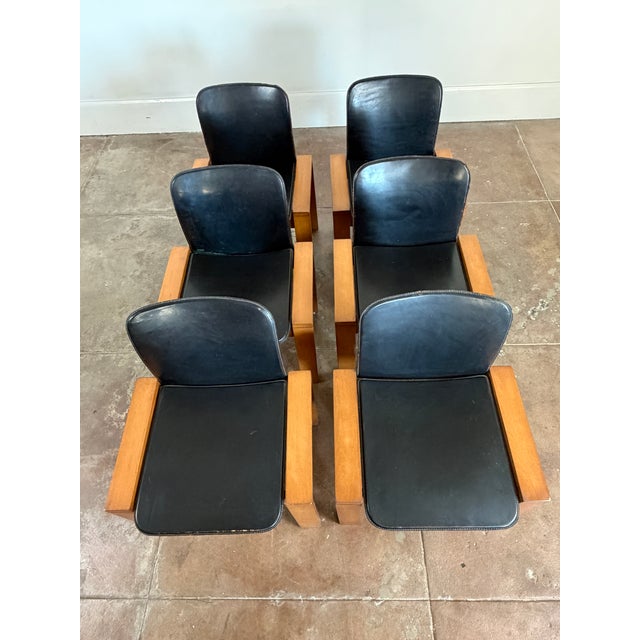1970's italian black leather dining chairs in good vintage condition. In the manner of Tobias Scarpa. Patina all around...