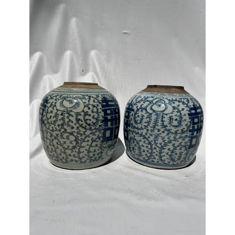 A matching pair of antique Chinese export porcelain round or melon shaped ginger jars featuring finely painted decoration...