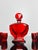 Complete seven-piece Art-deco Moser glass set comprising one ruby red decanter with stopper and six matching shot glasses....