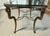 Versatile heavy solid antiqued brass table with thick ogee edge heavy glass top can add a sparkle to any room. This table...