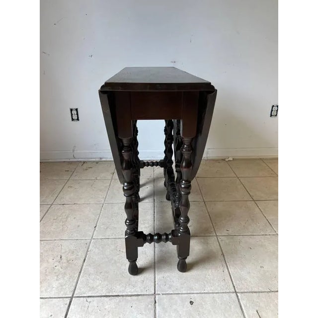 19th Century Antique English Walnut Barley Twist Gate Leg Drop Leaf Dining Table Solid wood frame, well carved with small...