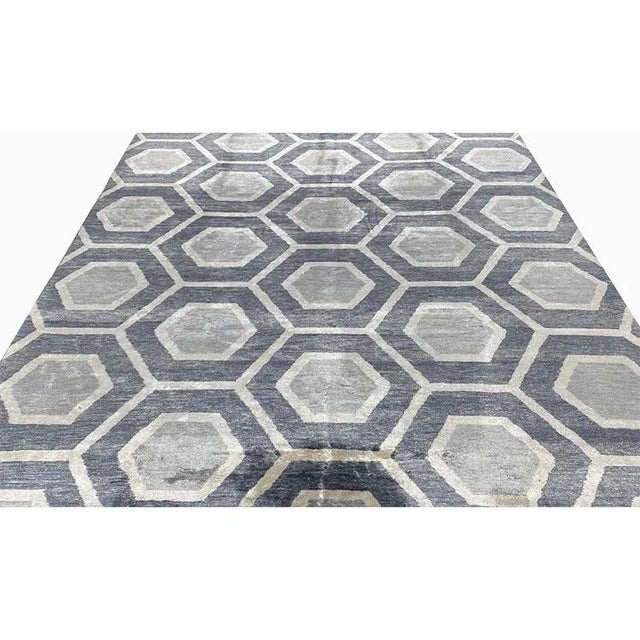 Modern Silk Area Rug featuring a mesmerizing allover geometric design in a lusciously beautiful gray and white color...