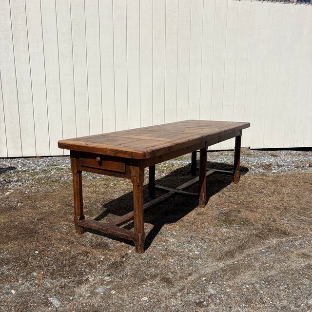 A beautifully aged French farmhouse dining table in warm, richly patinated oak, full of character and authenticity. The...
