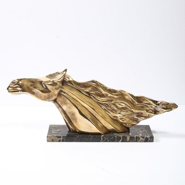 This stunning Art Deco stylized stallion sculpture was realized in France circa 1940. It features an equine form with a...