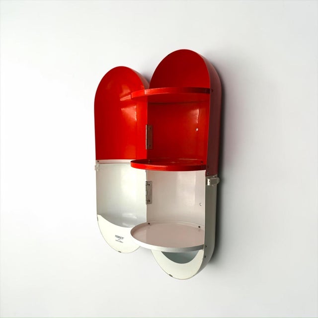 Gélule medicine cabinet designed by fabrice berrux and produced by périgot in france during the 2000s. the cabinet takes...