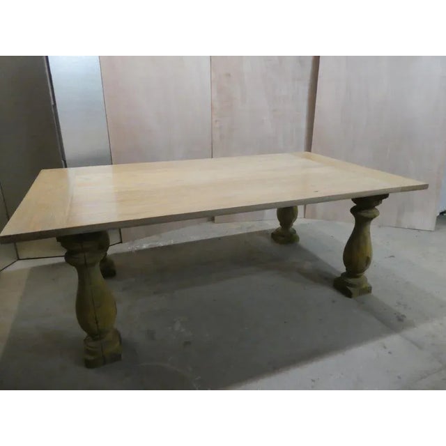 This is a weathered finish dining table with an oak top with a subtle whitewash finish and baluster legs, seats 6, ships...