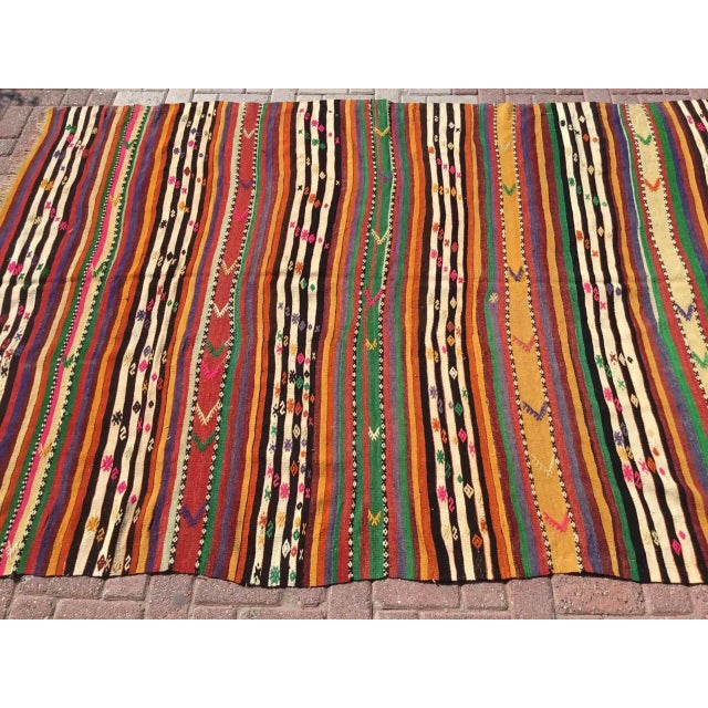 This beautiful, vintage, handwoven Kilim is approximately 60 years old. It is handmade, of very fine quality hand spun...