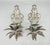 Stunning pair of Hollywood Regency candle sconces from the late 20th to early 21st century. Shaped like ornate palm trees...