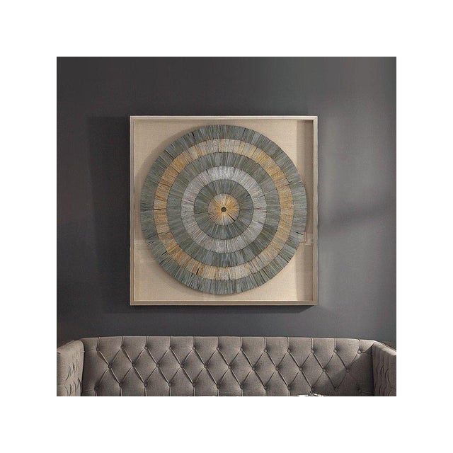 The Uttermost Savala Shadow Box (Model R04156) is a large, 3D wall art piece featuring intricate, hand-folded recycled...