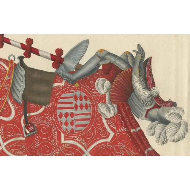 19th-Century Hand-Coloured Lithograph: Ornate Jousting Knights with Striking Heraldry This exceptional original hand-...