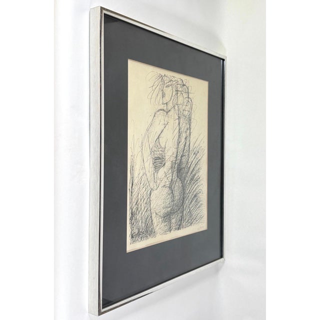 Mid century 1952 lithograph by Marcel Gromaire (French, 1892-1971) titled “Standing Nude”. Edition number 68/500. Framed...
