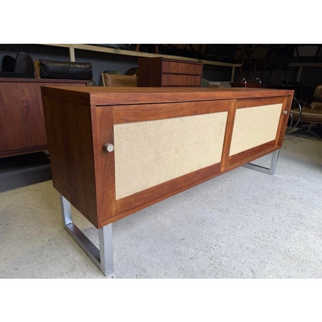 In really good used condition with brand new rattan panel on doors. The handles are made out of stone which create a nice...