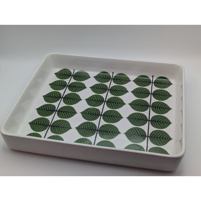 This original stoneware piece showcases the sophisticated craftsmanship of the Swedish studio pottery movement. The...