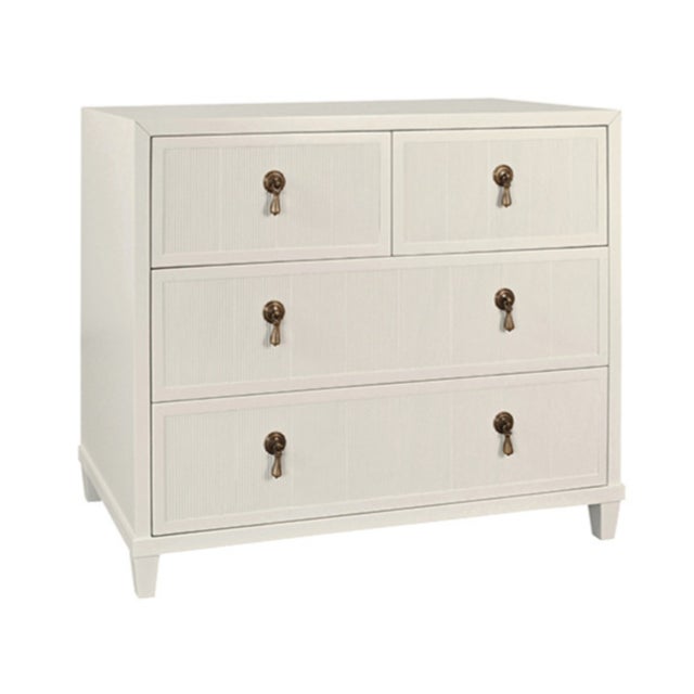 New special order item. Not vintage. The elegant Pascal four-drawer chest features beautiful fluted drawer fronts that add...