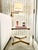 A chic pair of side tables that combine the clarity of Lucite with the warmth of brass. Each table has sculptural Lucite...