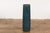 A Prem Collection ceramic handcrafted artisan floor vase with blue textured finish. Showcasing sleek lines and a blue...