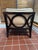 Available is a single lounge chair designed by Laura Kirar for Baker Furniture. The chair features an architectural dark...