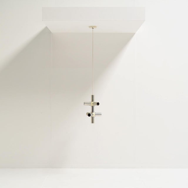 Designed in the mid-1960s by the famous Swiss architects Trix and Robert Haussmann, this modular lamp fits perfectly...
