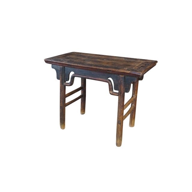 Mid-century Chinese provincial elm altar table. Made from elm with clean architectural framing. The rectangular table top...