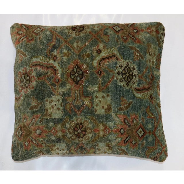 Pillow made from a 20th century Persian Rug with cotton back. Zipper closure and foam insert provided. 16'' x 17''
