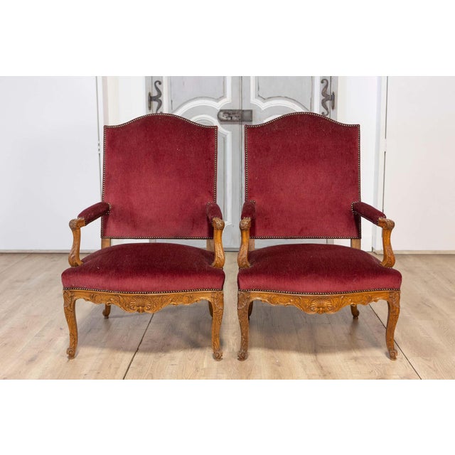 This stunning pair of 19th century French armchairs exemplifies the elegance and artistry of the period. The solid walnut...