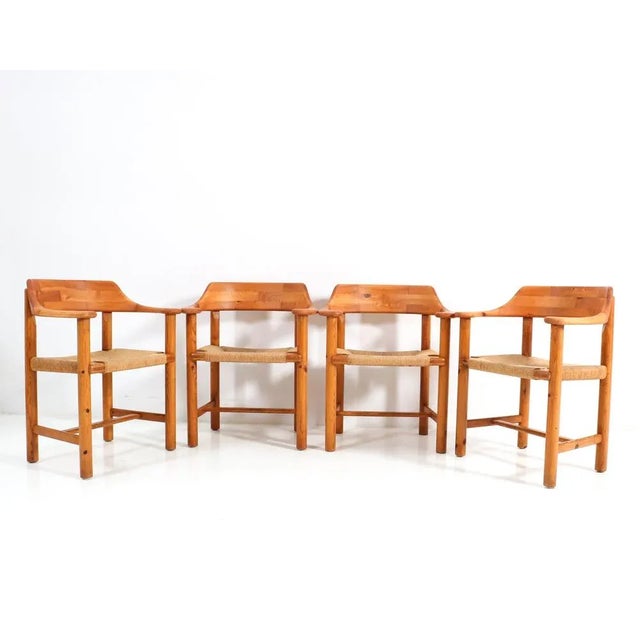 Magnificent and rare set of four Mid-Century Modern armchairs. Design by Rainer Daumiller for Hirtshals Savvaerk. Striking...