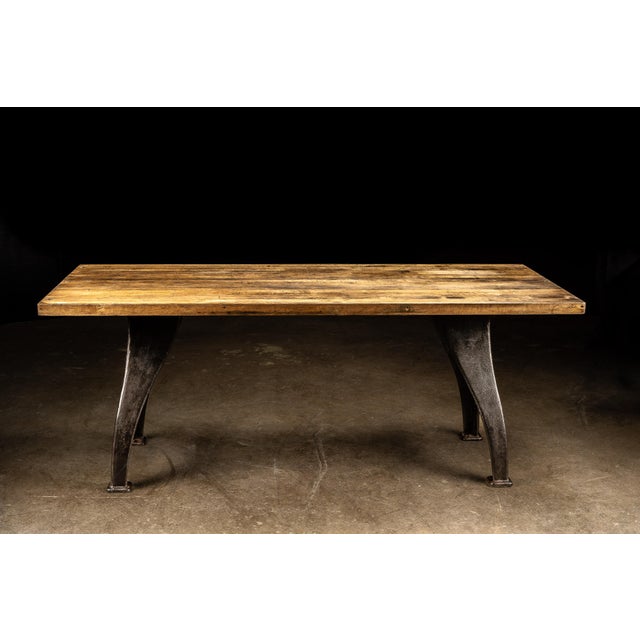 This vintage table features a butcher block that has been completely refinished by hand to preserve the decades of aging...