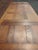 French Provincial style draw leaf dining table, the well-figured oak parquet top with two pull-out leaves, above the...